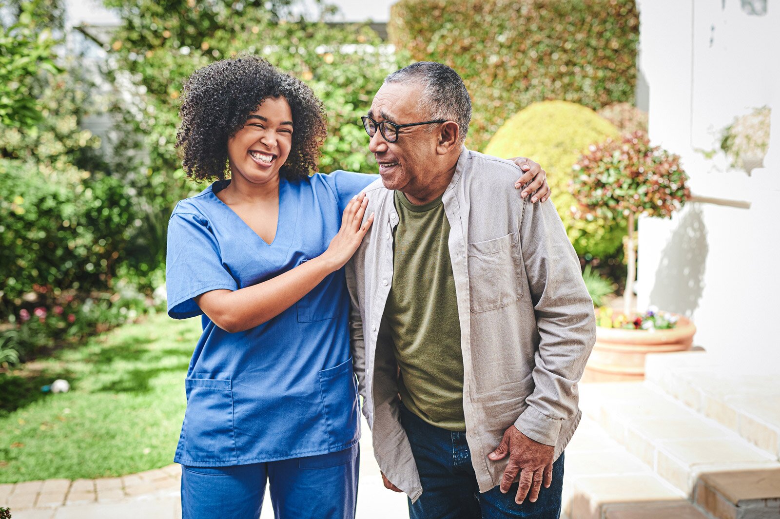 sl_better-living-care-choices-caregiver-walking-with-man