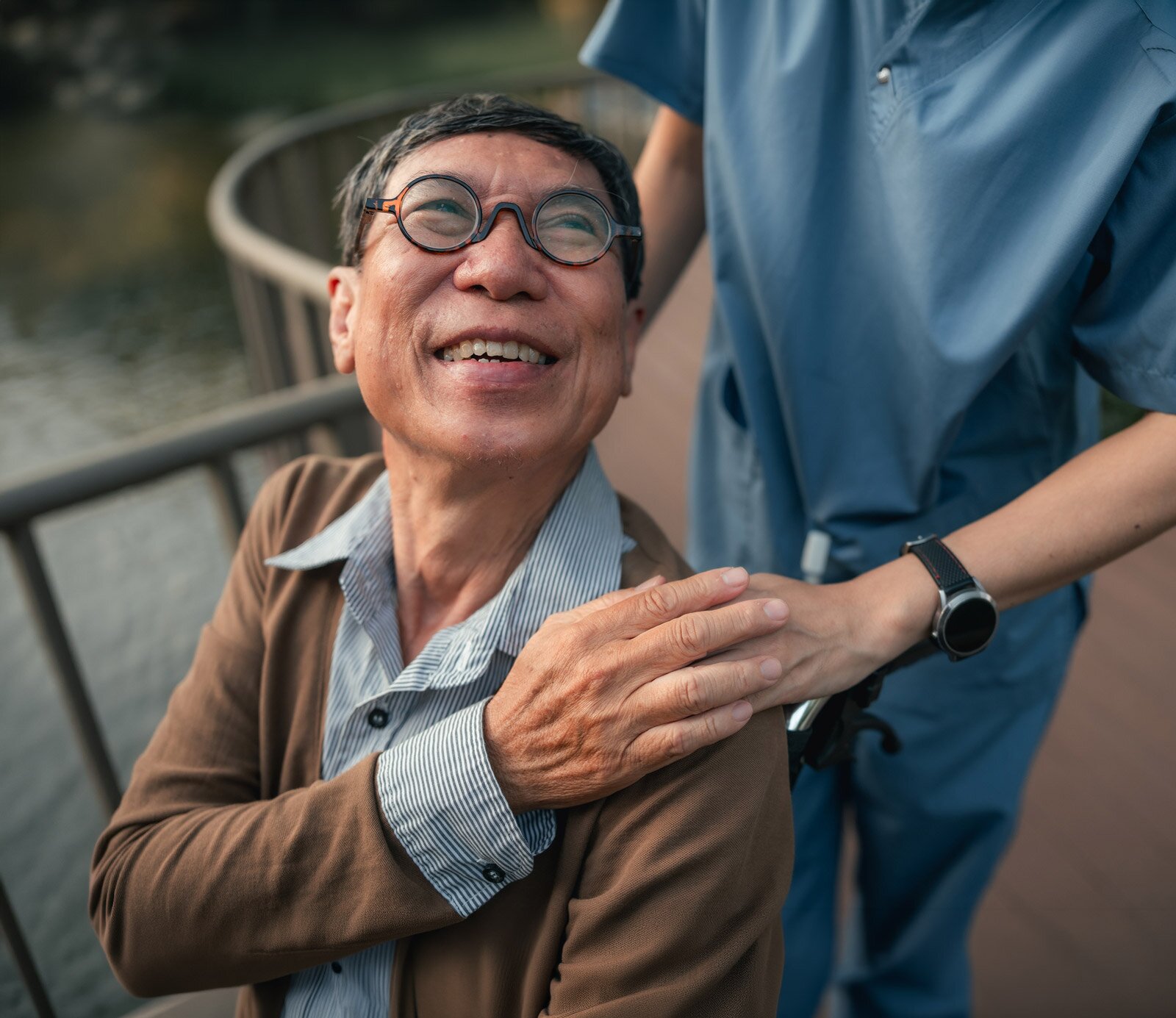 sl_better-living-care-choices-man-with-caregiver-hand