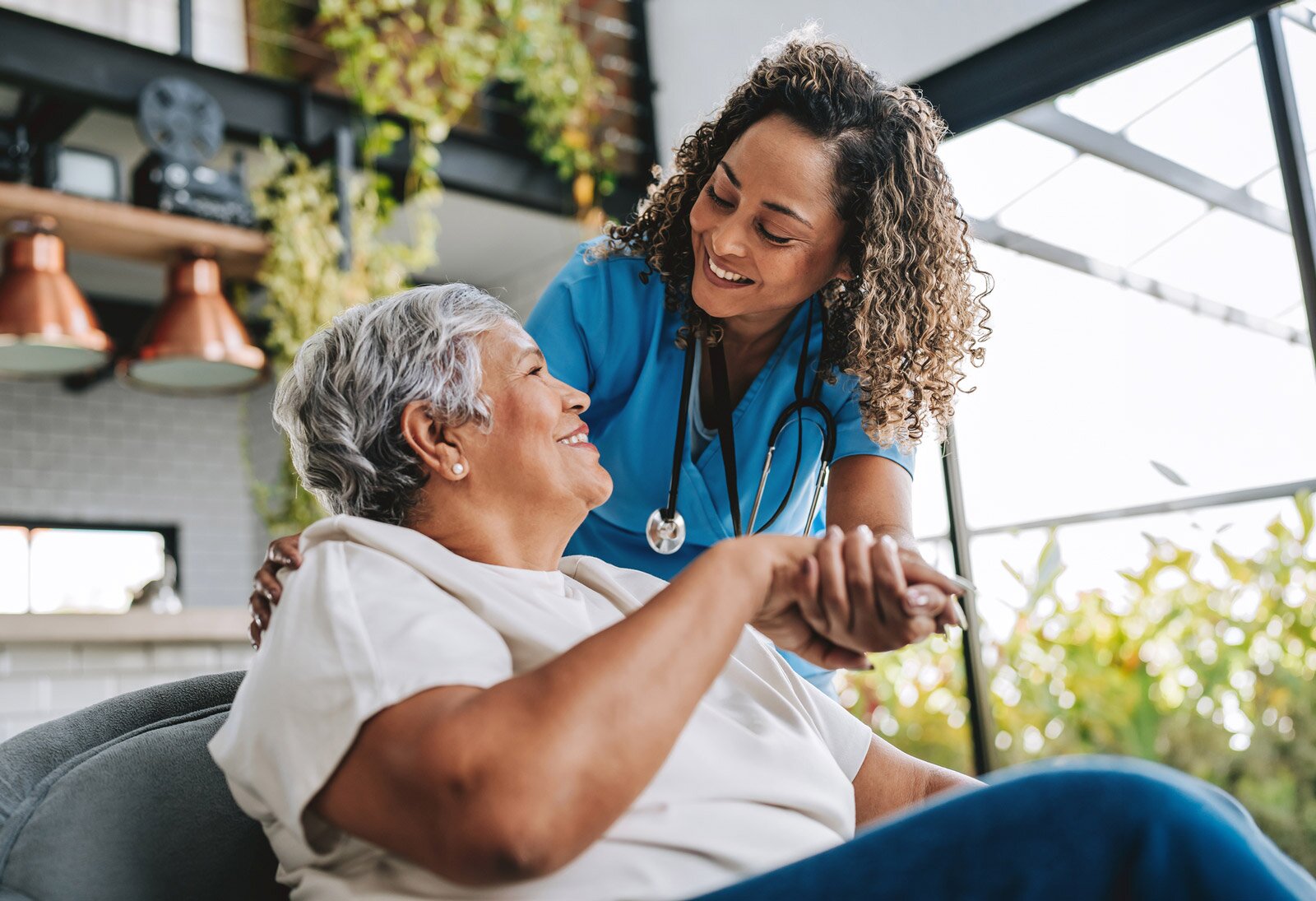 sl_better-living-care-choices-nurse-holding-hands