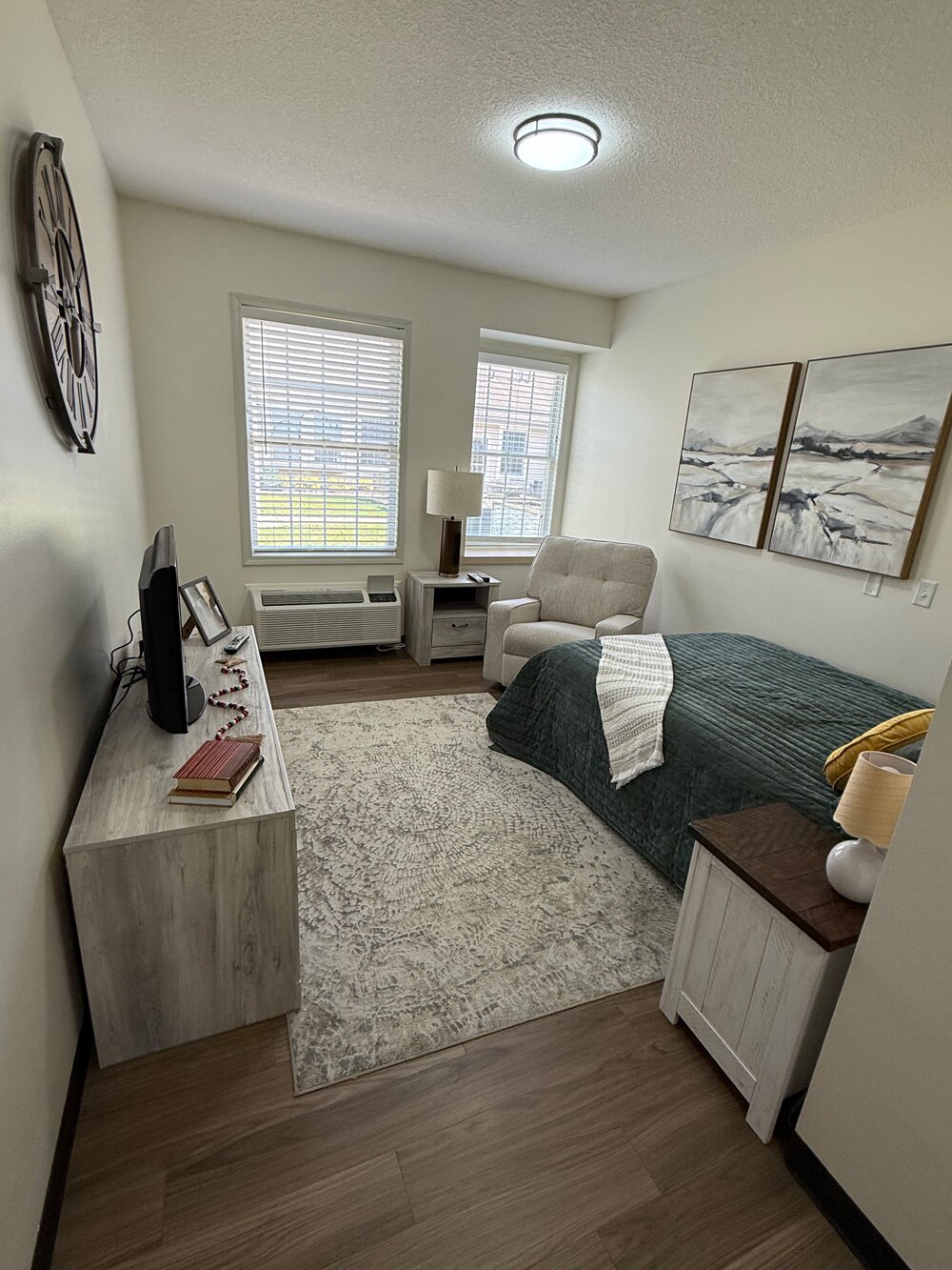 Cozy small bedroom with single bed and armchair